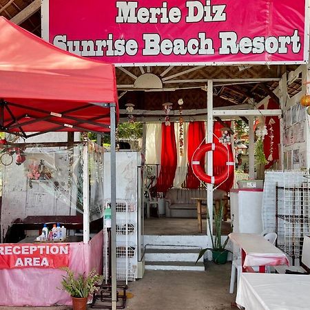 Oyo 899 Merie Diz Sunrise Beach Resort ออสลอบ ภายนอก รูปภาพ