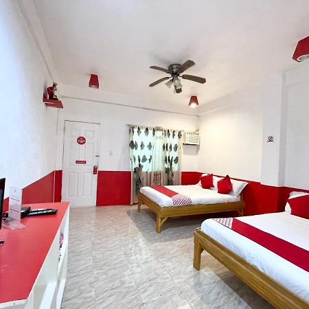 Oyo 899 Merie Diz Sunrise Beach Resort ออสลอบ ภายนอก รูปภาพ