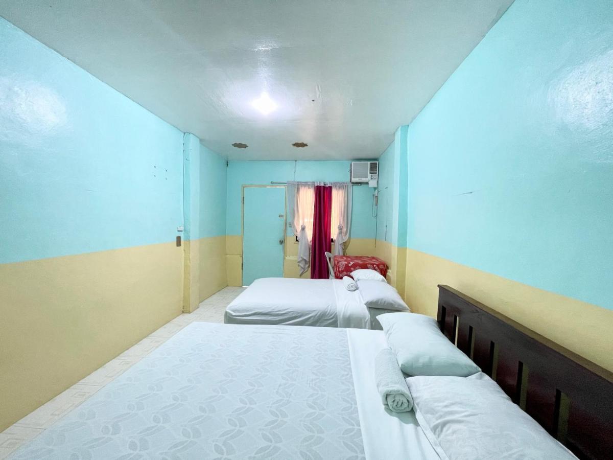 Oyo 899 Merie Diz Sunrise Beach Resort ออสลอบ ภายนอก รูปภาพ