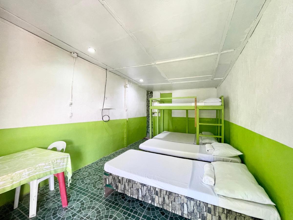 Oyo 899 Merie Diz Sunrise Beach Resort ออสลอบ ภายนอก รูปภาพ