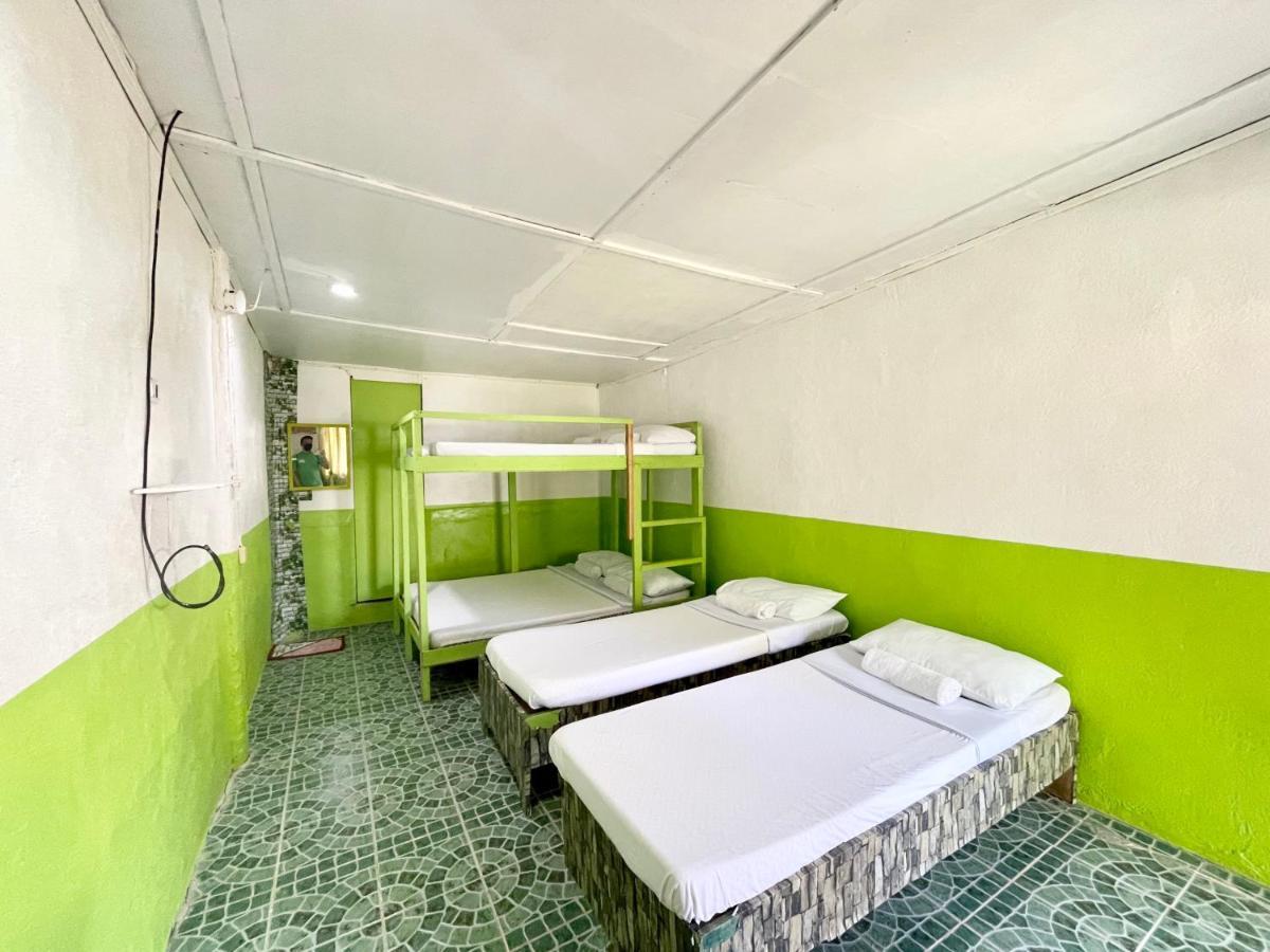 Oyo 899 Merie Diz Sunrise Beach Resort ออสลอบ ภายนอก รูปภาพ