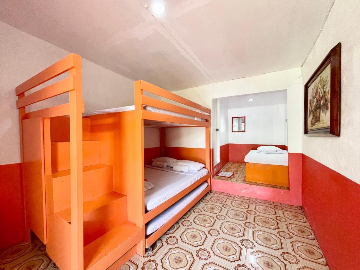 Oyo 899 Merie Diz Sunrise Beach Resort ออสลอบ ภายนอก รูปภาพ