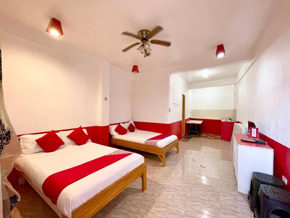 Oyo 899 Merie Diz Sunrise Beach Resort ออสลอบ ภายนอก รูปภาพ
