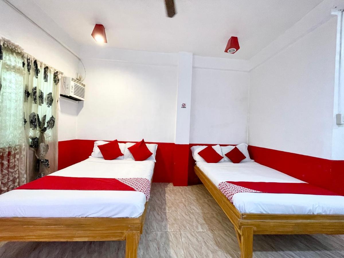 Oyo 899 Merie Diz Sunrise Beach Resort ออสลอบ ภายนอก รูปภาพ