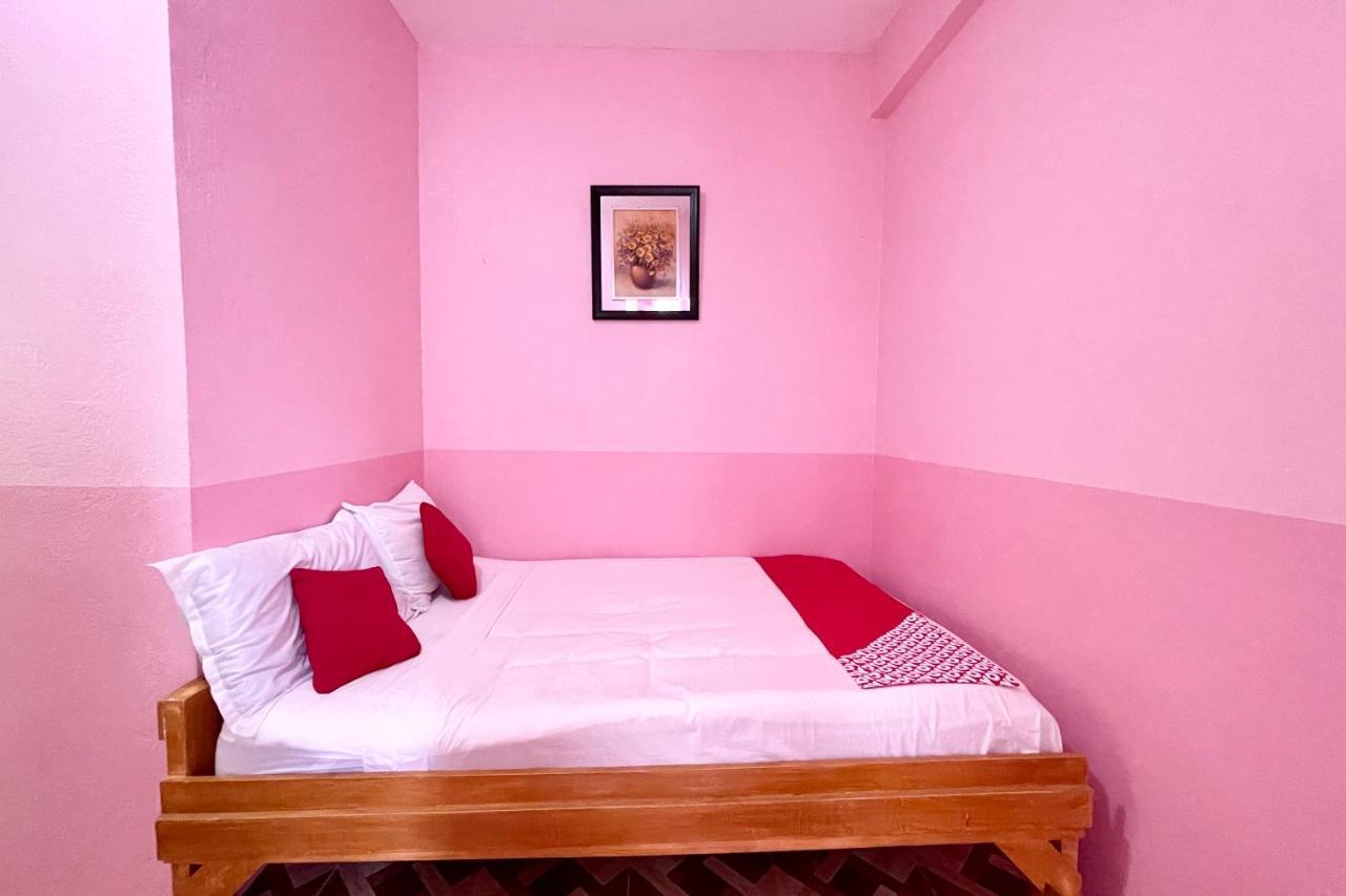 Oyo 899 Merie Diz Sunrise Beach Resort ออสลอบ ภายนอก รูปภาพ