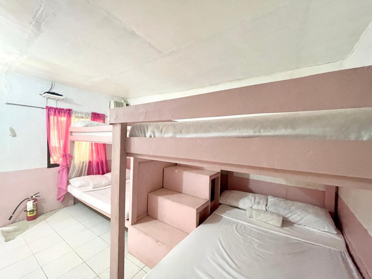 Oyo 899 Merie Diz Sunrise Beach Resort ออสลอบ ภายนอก รูปภาพ