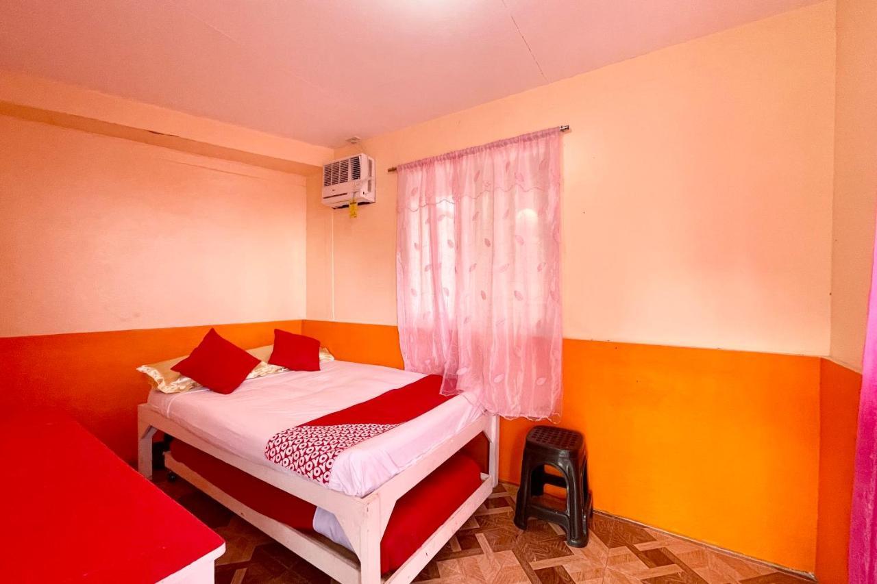 Oyo 899 Merie Diz Sunrise Beach Resort ออสลอบ ภายนอก รูปภาพ
