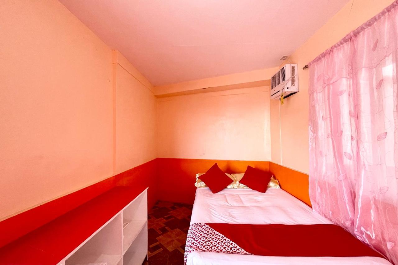 Oyo 899 Merie Diz Sunrise Beach Resort ออสลอบ ภายนอก รูปภาพ