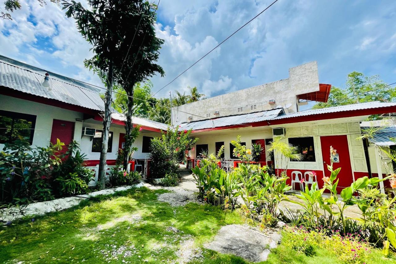 Oyo 899 Merie Diz Sunrise Beach Resort ออสลอบ ภายนอก รูปภาพ