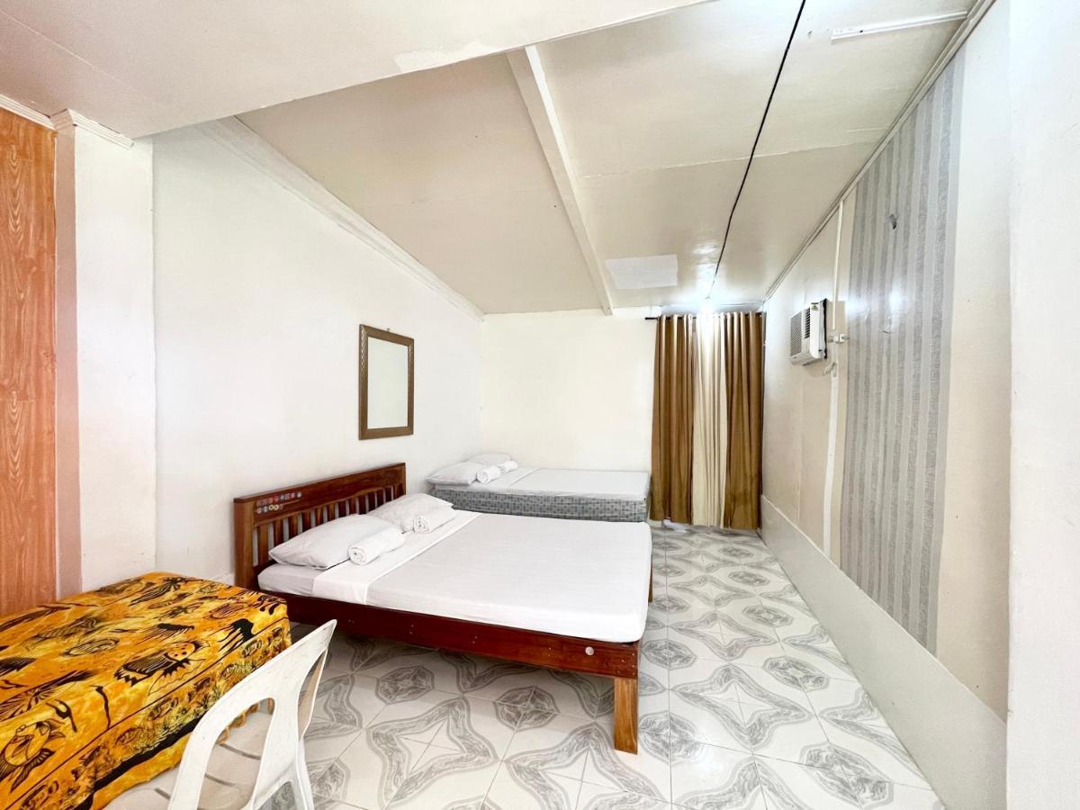Oyo 899 Merie Diz Sunrise Beach Resort ออสลอบ ภายนอก รูปภาพ