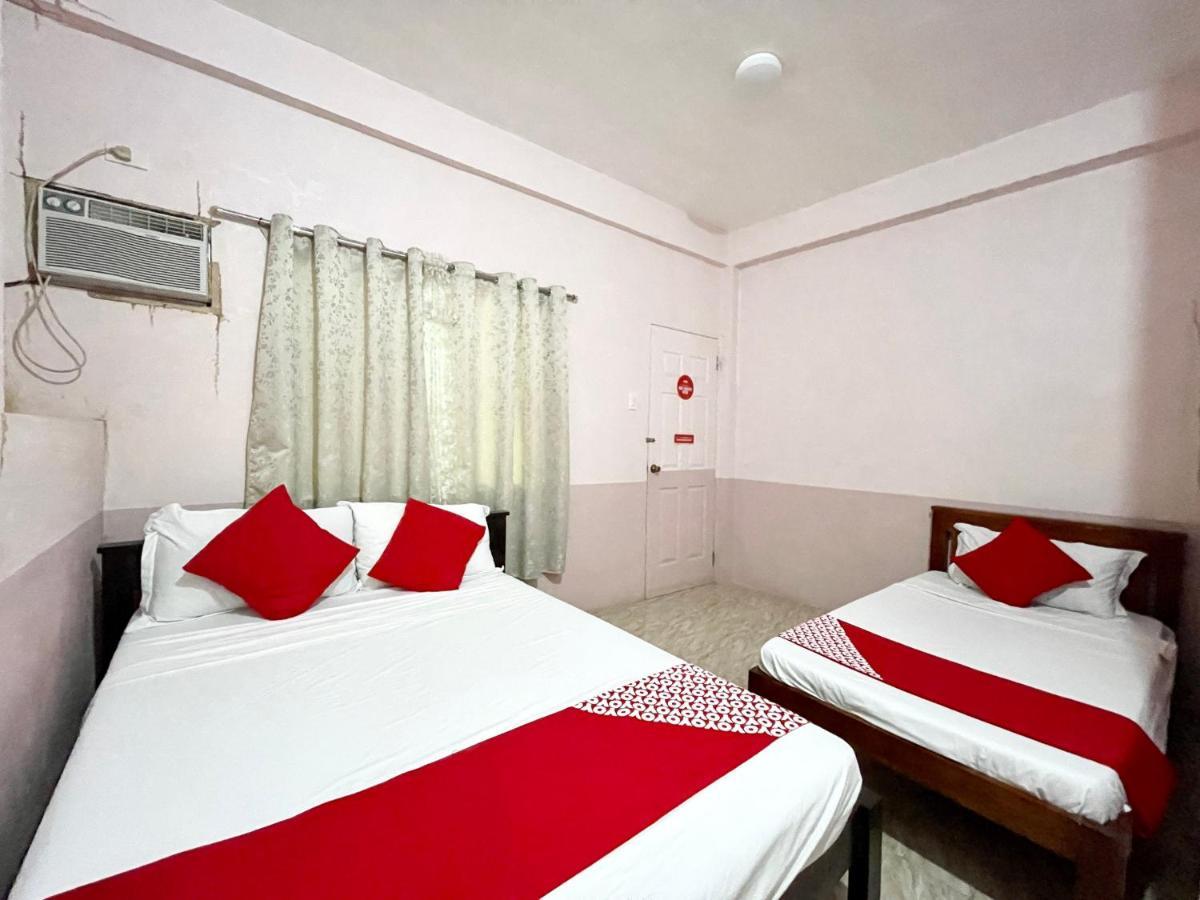 Oyo 899 Merie Diz Sunrise Beach Resort ออสลอบ ภายนอก รูปภาพ