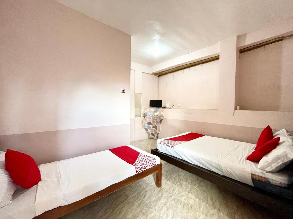 Oyo 899 Merie Diz Sunrise Beach Resort ออสลอบ ภายนอก รูปภาพ