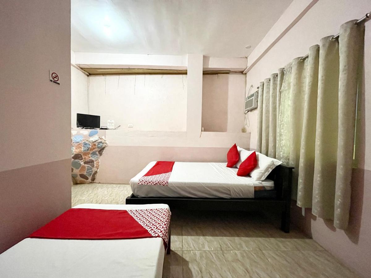 Oyo 899 Merie Diz Sunrise Beach Resort ออสลอบ ภายนอก รูปภาพ